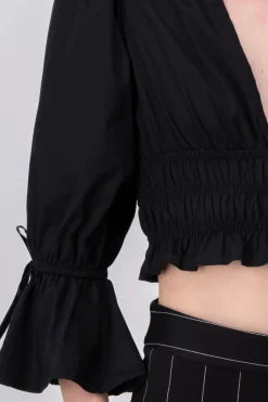 Blusa crop popelina olanes mangas