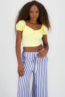 Camisa con pinzas y mangas abullonadas