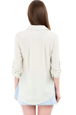 Camisa manga larga bolsos maxi