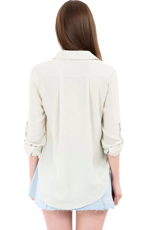 Camisa manga larga bolsos maxi