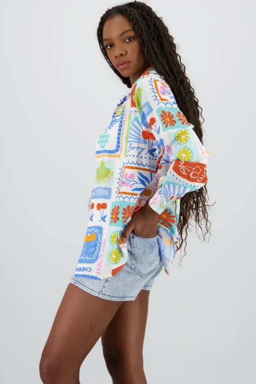 Camisa oversize manga larga detalle botones