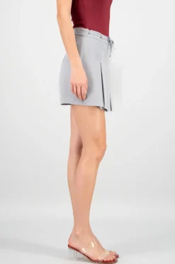 Falda mini plisada tira moño Hyps