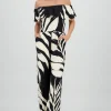 Jumpsuit off shoulder estampado