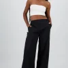 Pantalon amplio detalle franjas contraste