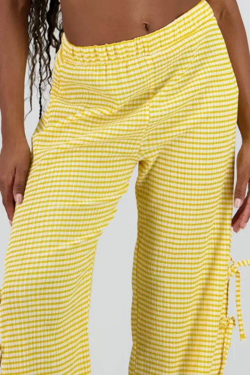 Pantalon amplio detalle lazos estampado