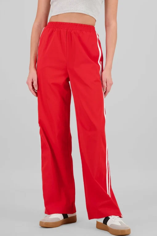 Pantalon fluido detalle rayas