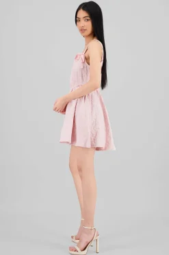Vestido textura con moños