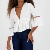 Blusa amarre detalle mangas