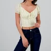 Blusa con mini polkas con lace up en la espala