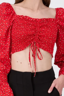 Blusa crop flores manga larga