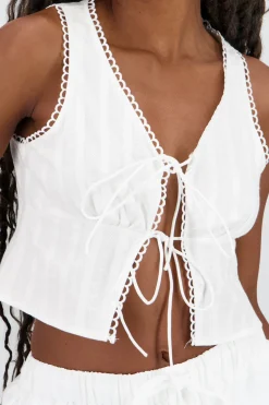 BLUSA DETALLE MOÑOS