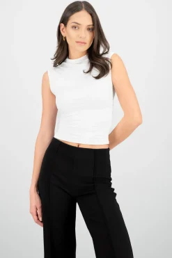 Blusa drapeada cuello alto