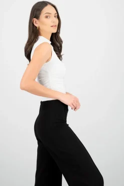 Blusa drapeada cuello alto