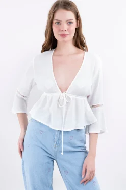 Blusa escote mangas cortes