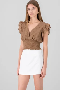 Blusa eyelet escote v