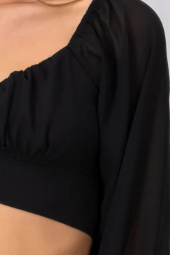 Blusa manga larga detalle amarre