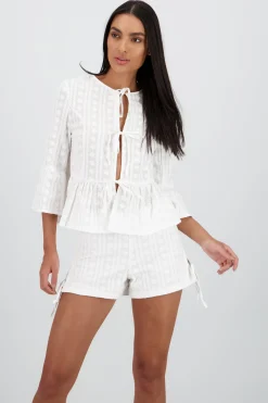 Blusa manga larga lazos detalle textura