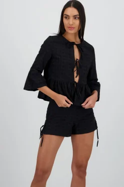 Blusa manga larga lazos detalle textura