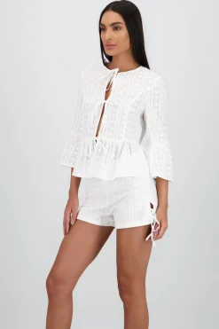 Blusa manga larga lazos detalle textura