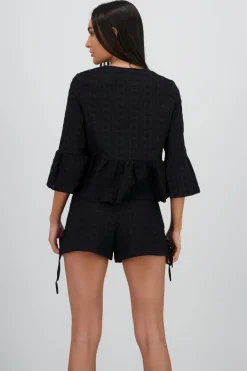 Blusa manga larga lazos detalle textura