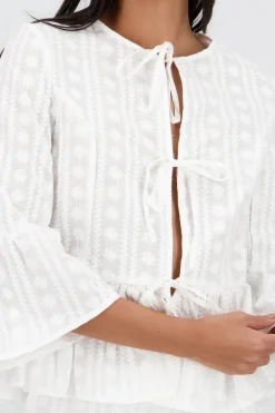 Blusa manga larga lazos detalle textura