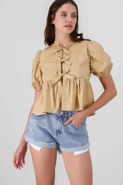 Blusa mangas abullonadas detalle moños