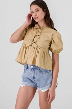 Blusa mangas abullonadas detalle moños