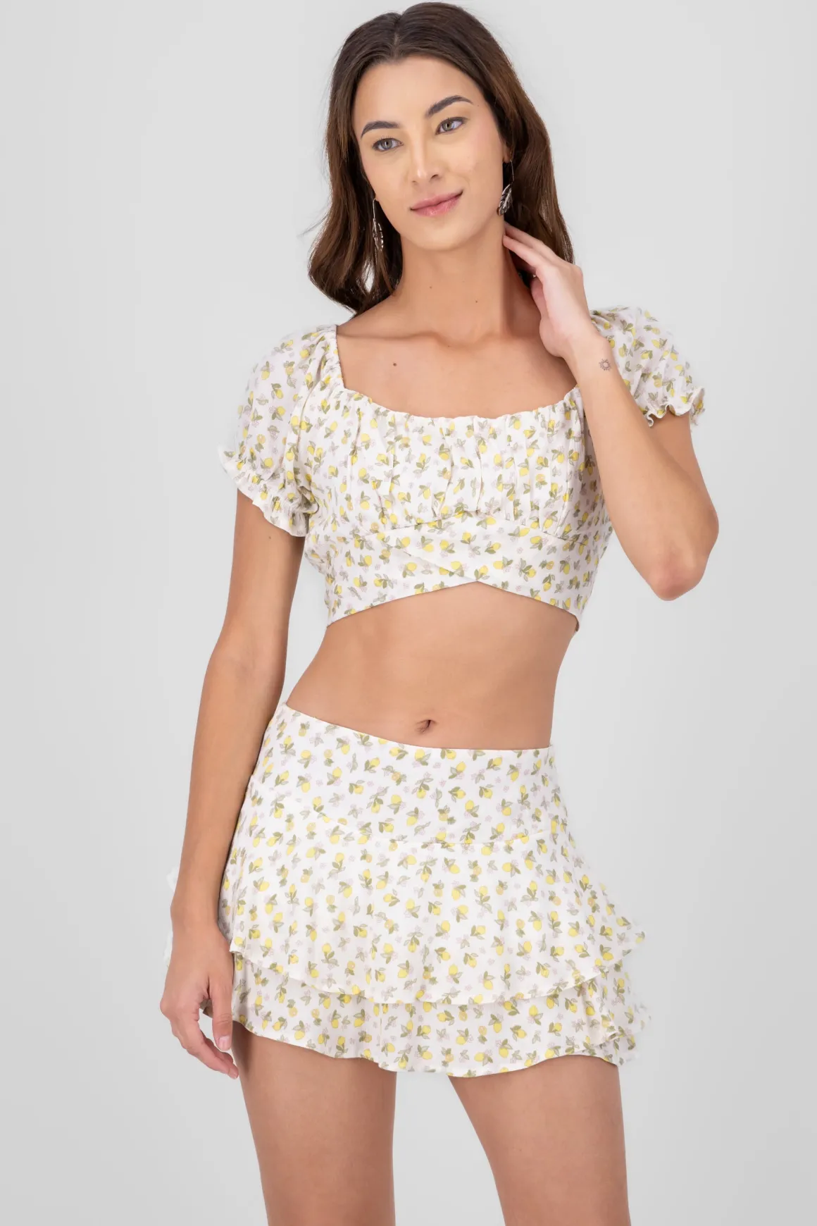 Blusa mnaga abullonada detalle liston estampada