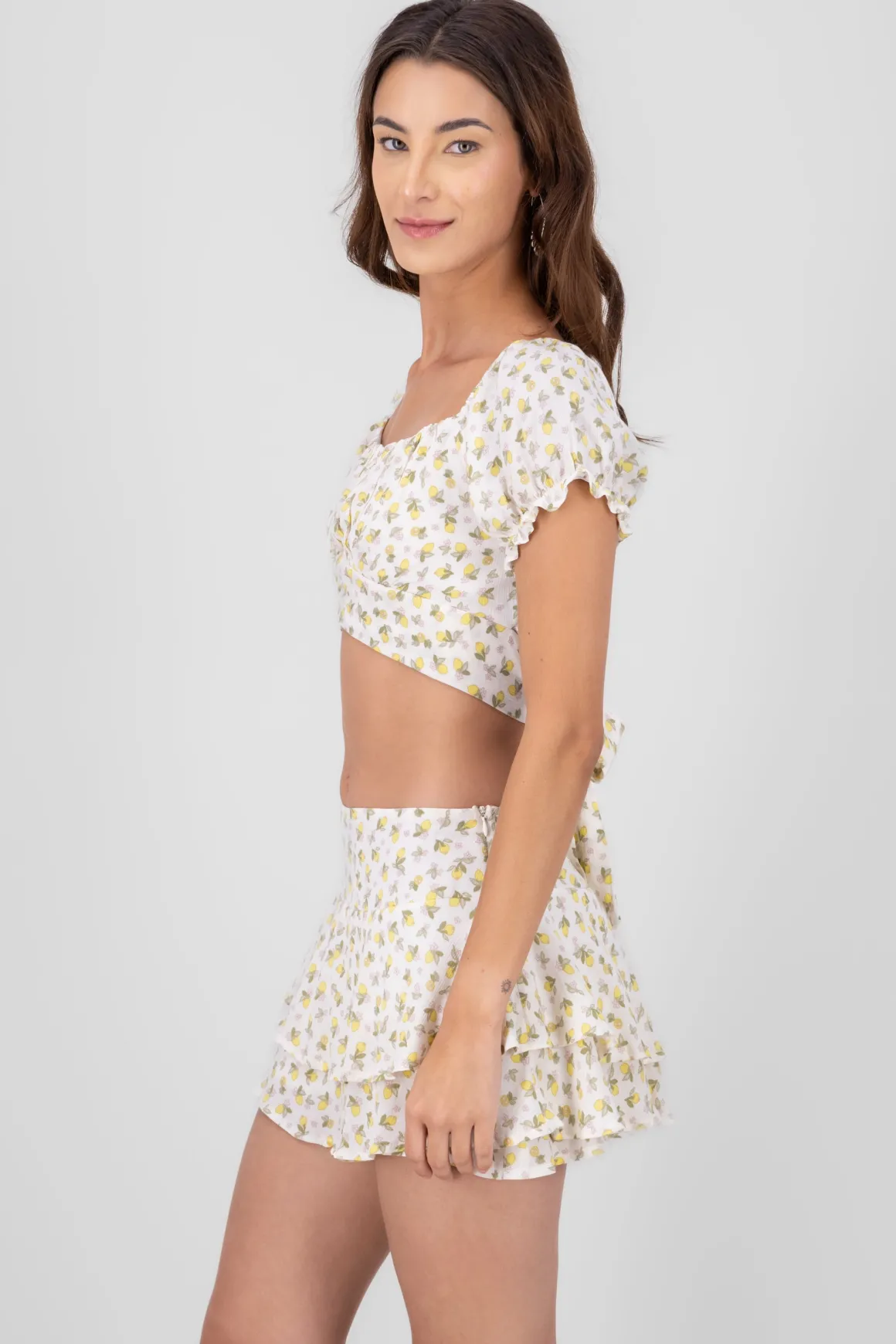 Blusa mnaga abullonada detalle liston estampada