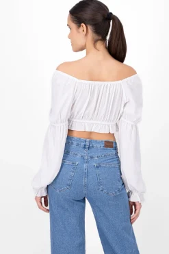 Blusa moños detalle mangas