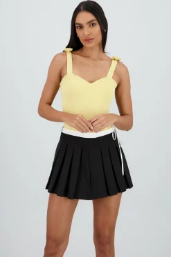 Bodysuit liso con tirante moños