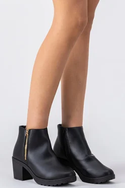 Botín cierre lateral suela track