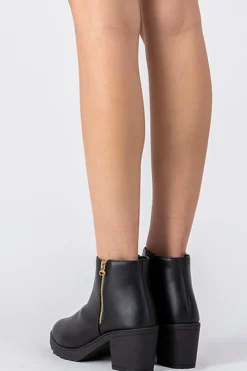 Botín cierre lateral suela track