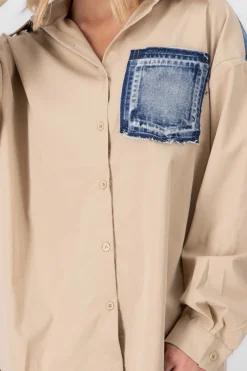 Camisa larga detalle bolsa denim