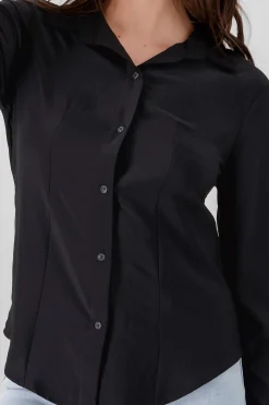 Camisa lisa manga larga detalle pinzas