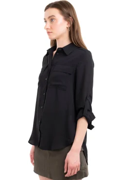 Camisa manga larga bolsos maxi