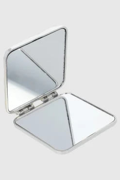 Espejo compacto metal derretido