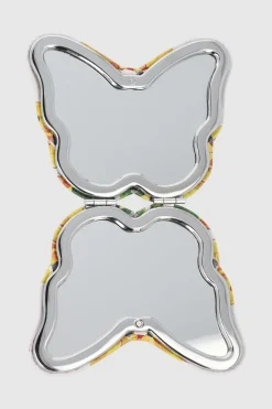 Espejo mariposa flor