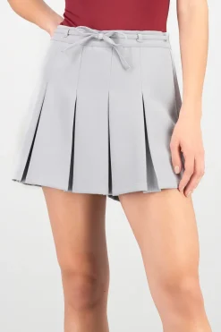 Falda mini plisada tira moño Hyps