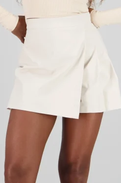 Falda mini pretina detalle tablas