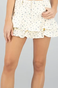 Mini falda olanes con mini flores de denim