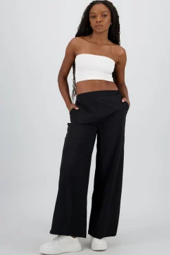 Pantalon amplio detalle franjas contraste