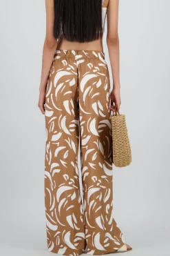 Pantalon amplio detalle resorte estampado figuras