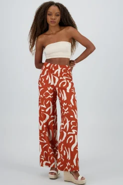 Pantalon fluido detalle estampado