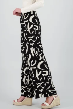 Pantalon fluido detalle estampado