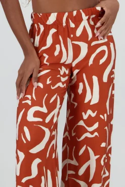 Pantalon fluido detalle estampado