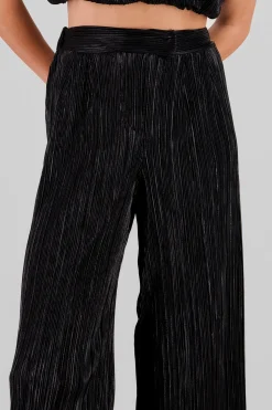 Pantalon textura brillo