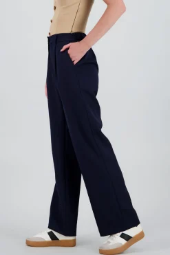 Pantalon tipo sastre detalle pinzas bolsas