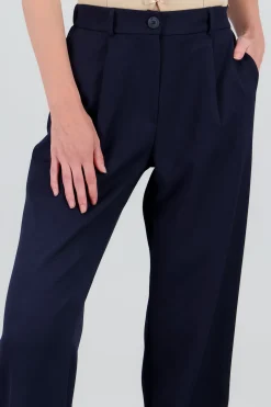 Pantalon tipo sastre detalle pinzas bolsas