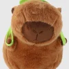 Pelucha capibara mochila tortuga